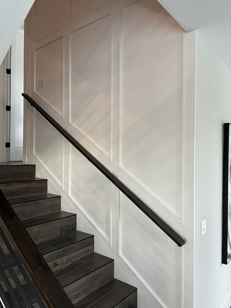 Board And Batten Foyer Entryway Stairs, Railing On Wall Stairways, Paneling Going Up Stairs, Trim Work Staircase, Closed Off Staircase Ideas, Wainscotting Up Staircase, Wall Trim Moulding Stairs, Stairwell Wall Ideas Paint, Stairway Wall Treatments