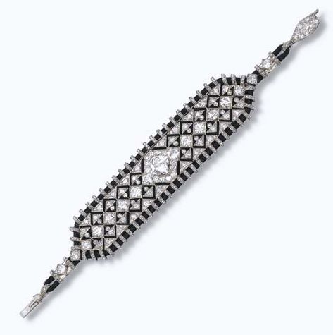 AN EXQUISITE ART DECO BRACELET, BY CARTIER  Of geometric diamond openwork design with a central cushion-shaped diamond to the black silk cord frame and velvet backing, circa 1925. Art Deco Bracelet, Onyx Jewelry, Cartier Jewelry, Onyx Bracelet, Indian Wedding Jewelry, Geometric Diamond, Silk Cord, Gemstone Jewellery, Deco Jewelry