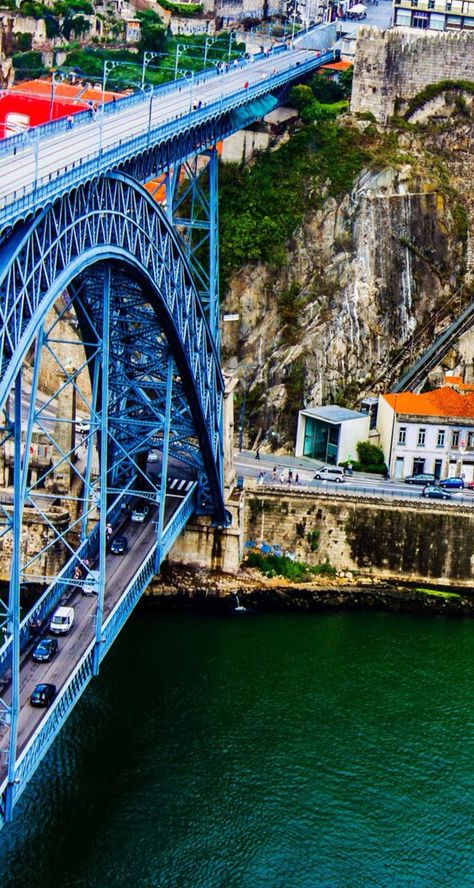 Ancient city Porto - the metallic Dom Luis Bridge Bridge Over Water, Body Of Water, Ancient City, Famous Landmarks, Portugal Travel, Spain And Portugal, Porto Portugal, A Bridge, Covered Bridges