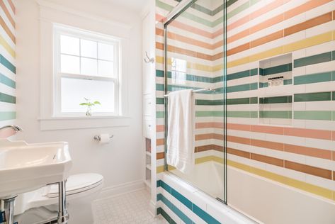 Start your day surrounded by rainbows, what could be better than that? With an array of colors, this rainbow bathroom tile is sure to make every day bright! DESIGN Brittany Buchser PHOTOS Cameron Behbahany INSTALLER C. Cook LLC, Custom Interiors LOCATION Portland, OR Tile Shown: 3x12 in White Wash, Amalfi Coast, Glacier Bay, Lemon Cream, Koi, Sorbet, Desert Bloom, Turquoise, Neptune Modular Bathroom Ideas, Ombre Tile, Colorful Bathroom Decor, Rainbow Bathroom, Rainbow Tile, Colorful Bathroom Tile, Colorful Tile, Blue Glass Tile, Colorful Bathroom