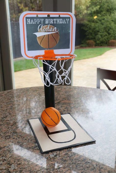 Aiden's Birthday Ball | CatchMyParty.com Basketball Centerpiece Ideas Diy, Basketball Theme Centerpiece Ideas, Basketball Birthday Party Centerpieces, Diy Basketball Centerpiece Ideas, Basketball Party Centerpieces, Basketball Game Themes, Basketball Centerpiece Ideas, Basketball Theme Birthday Party, Basketball Centerpieces