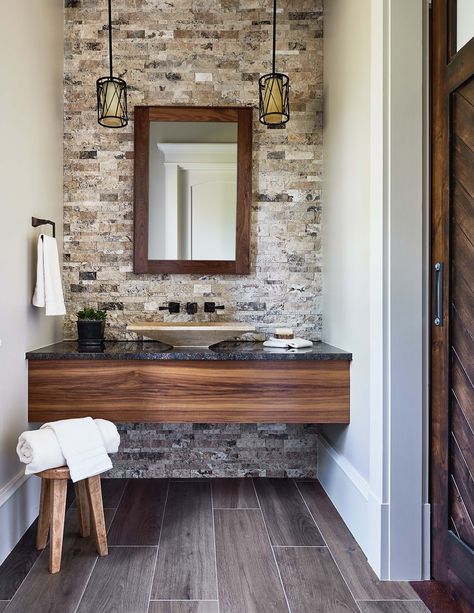 Natural elements of stone and wood are features consistent throughout the home - even the bathroom. Mountain Bathroom, Stone Accent Walls, Bathroom Accent Wall, Bathroom Accents, Stone Bathroom, Raleigh North Carolina, Rustic Bathrooms, Custom Built Homes, Rustic Living