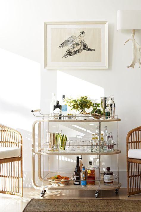 Is it happy hour yet? Made of bleached wood and a leather wrapped handle, the bar cart looks at home in town and country. Shop the Brays Bar Cart designed by Beth Webb for Arteriors at 2Modern. Bar Cart And Shelves, Bar Cart Inspo, Beth Webb, Wood Bar Cart, Modern Bar Cart, Bar Cart Styling, Bleached Wood, Arteriors Home, Luxury Furniture Brands