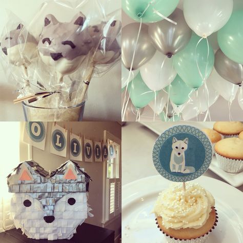 Arctic fox birthday party. Homemade cake pops, piñata and cupcake toppers. Wolf Themed Birthday Party Food Ideas, Artic Fox Birthday Party, Arctic Fox Cake, Husky Birthday Party, Arctic Fox Birthday Party, Wolf Cupcakes Birthday, Wolf Themed Birthday Party, Fox Birthday Party, Fox Cake