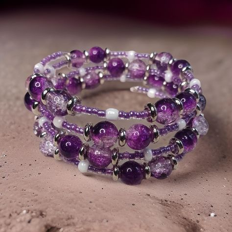 Looking for a unique piece to complete your ensemble? Look no further than our multi strand memory wire bracelet in shades of lavender and purple beads. Handmade with love and care, this bracelet showcases a beautiful combination of purple, lavender and purple lined beads that will elevate any outfit. Wrap it around your wrist for a touch of elegance and flair. Memory Wire Bracelets Ideas, Goth Shopping, Wire Wrap Bracelets, Purple Bracelets, Memory Wire Wrap Bracelets, Bracelets Easy, Bracelet Inspo, Inspiration Painting, Purple Beads