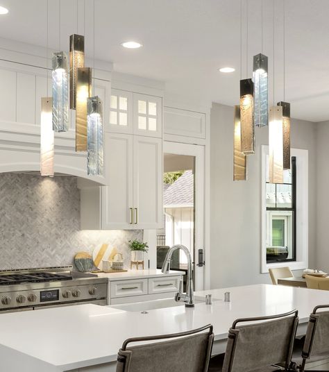 "The kitchen island is the heart of the house. The right lighting above the kitchen island will upscale all interior design in the space.   This light installation creates warm glowing light and affects the feeling of your loved ones while staying in this space.  Each 'Sunbeam' glass pendant light is handmade with great craftsmanship in our studio.  It is fully customizable both in pendant quantities and colours.  If you have any questions about placing a custom order, please do not hesitate to reach out! We'd be happy to assist in creating the lamp that is perfect for you. Best as kitchen island light - in your choice of colour and any number of pendants you need On one long ceiling mount or few separate mounting, with the finish that will best suit your kitchen design Tell us the size of Modern Kitchen Island Lights, Pendulum Lights Kitchen Islands, Large Island Pendant Lights, Kitchen Island Pendant Lighting Ideas, Large Pendant Lights Over Kitchen Island, Kitchen Island Lighting Ideas, Kitchen Island Pendant Lights, Kitchen Lighting Ideas Over Island, Over Island Lighting