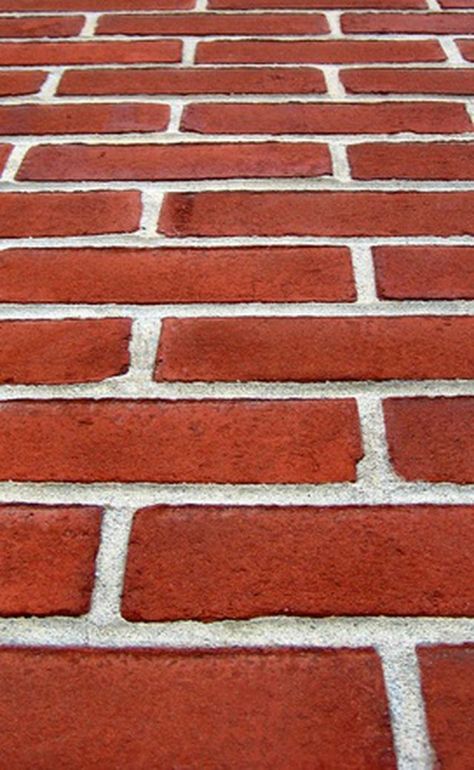 Laying brick over existing tile is oftentimes a good option for a do-it-yourselfer or contractor, rather than removing the old tile completely. Only lay brick over tile if the...