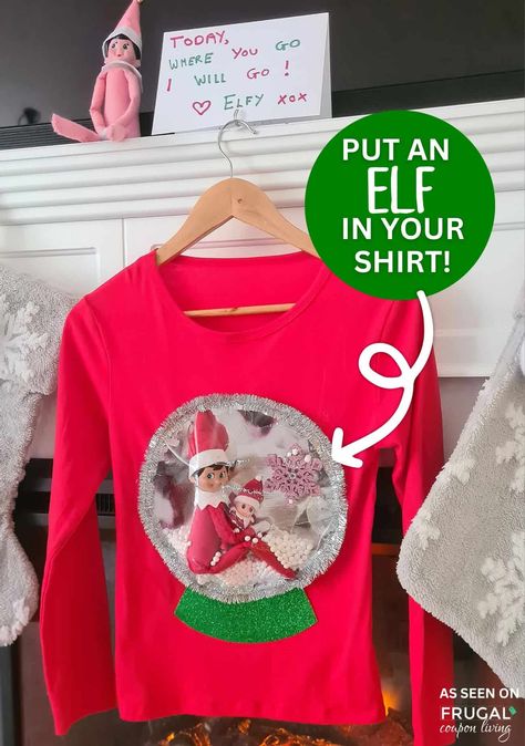 Can you carry The Elf on the Shelf! The answer is yes but remember The Elf on the Shelf rule, don't touch him! Create a fun, wearable elf t-shirt where your child can carry their family elf all day! This creative DIY t-shirt features Scout Elf ready for a playful adventure with your child! This is a must try, unqiue idea for The Elf on the Shelf. New Ideas for The Elf on the Shelf and free Christmas printbles. Elf On The Shelf Ideas Last Few Days, Elf On The Shelf Ugly Sweater Diy, Scout Elf Ideas, Diy Elf Shirt, Elf Day At School Outfit, Diy Elf On The Shelf Clothes, Kids Elf Outfit, Last Day Elf On The Shelf Ideas, Elf On A Shelf Printables