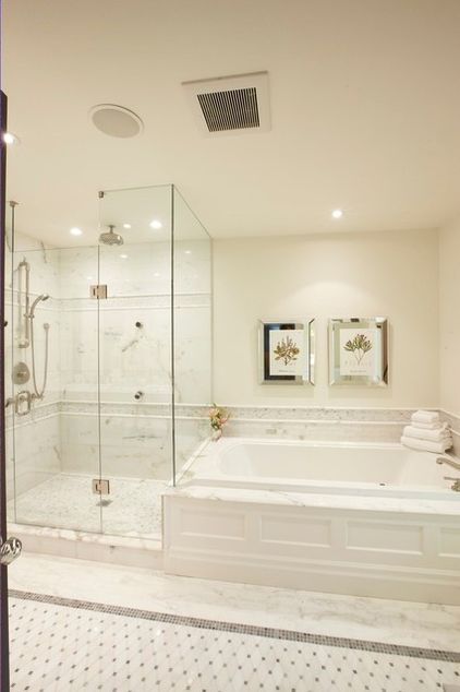 Mirrored frame artwork turns on the glam above this soaker tub for two. Bathroom Ideas With Tub And Shower Separate, Master Bath With Separate Shower And Tub, Drop In Tub Master Bath, Tub Shower Next To Each Other, Nature Inspired Master Bath, Tub Beside Shower Master Bath, Bathroom Tub And Shower Separate, Separate Bath And Shower Ideas, Built In Soaker Tub