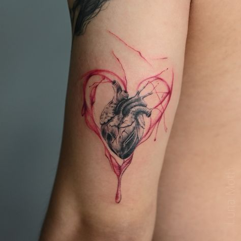 . Done by Angelina @chase.ink.you This stunning tattoo design blends anatomical precision and abstraction in one artwork! The black heart, as if taken straight from a biology textbook, is surrounded by a blood-red outline that adds powerful contrast and depth. 🖤❤️ This tattoo design is a reminder of the physical basis of our emotions and life’s vitality. The red color symbolizes passion, love, and strength all at once. Ready to charge up with emotions? Come express your uniqueness at our ... Red Heart Tattoo Designs, Colored Heart Tattoo, Dark Heart Tattoo, Red Black Tattoo, Black And Red Tattoo, Biology Tattoo, Black Red Tattoo, Anatomical Tattoos, Biology Textbook