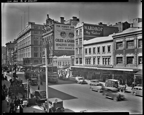 Elizabeth Street, Melbourne, west side, looking South across Bourke Street intersection, circa 1930s. on the far side of Bourke is the former State Savings Bank of Victoria (demolished 1970 for State Bank Centre (Galleria)) and Cromwell Buildings on near side (demolished 1960s) The building to the left of Wardrop's is one of Melbourne's oldest remaining structures, dating to the 1850s Copyright Free Images, Elizabeth Street, Australian History, Far Side, Melbourne Cbd, Savings Bank, Historic Photos, Melbourne Victoria, The Far Side