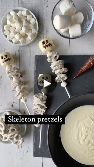 290K views · 20K reactions | Is it early for Halloween content?? 

Easy Halloween skeletons! Marshmallows dipped in white candy coating with some store-bought white fudge pretzels. The sticks are extra long lollipop sticks, and I piped on a little skeleton face after the marshmallows had set up. 

#halloweentreats #halloweenparty #halloweencandy #funfood #marshmallows | Hannah Gray | One Sweet Mama | Martin Arteta · Past Lives White Pretzels, White Fudge, Halloween Candy Recipes, Postres Halloween, Wilton Candy Melts, Marshmallow Dip, Skeleton Face, Chocolate Covered Marshmallows, Halloween Treats For Kids