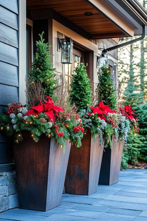 Add holiday flair with Christmas Planter Ideas! Use Outdoor Christmas Planters and Winter Planters to bring warmth to your decor. Save this pin and visit the article for more inspiration. How To Decorate Urns For Christmas, Winter Flower Pots Front Porches, Holiday Outdoor Planters, Front Porch Christmas Planters, Holiday Planters Front Porches, Christmas Outdoor Planter Ideas, Winter Pots Outdoor Planters, Outdoor Winter Pots, Outdoor Christmas Planter Ideas