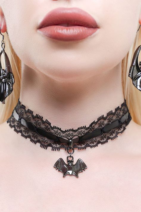 MOURNING MAIDEN.- Statement lace choker.- PU strap.- Statement bat hardware.- Adjustable clasp closure.- Height 3cm / 1.2"- To fit neck size 29cm - 43cm / 11.4" - 16.9"- Bat height 2cm / 0.8".With KILLSTAR branding, Fabric 1: 100% Polyester, Fabric 2: 100% PU, Metal: 100% Zinc alloy.Hand wash delicate 30°c / Do not bleach / Do not tumble dry / Iron at low temperature / Do not dry clean. Imported. Goth Choker, Lace Choker, 16 9, Zinc Alloy, Choker, Bat, Jewelry Watches, Polyester Fabric, Branding