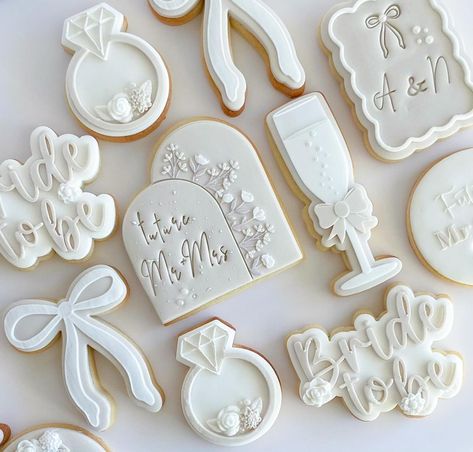 | Future Mr & Mrs 🥂🤍🤍🤍🎀. . . . . . . . . . . . #engament #engamentparty #engamentcookies #sydneycookies #mrandmrs #futuremrs #bridetobe… | Instagram Engagement Cookies Black And White, Future Mrs Cookies, Tying The Knot Cookies, Engagement Party Cookies Decorated, Minimalist Bridal Shower Ideas, Easy Bridal Shower Food, Bridal Shower Cookies Ideas, Classy Bridal Shower Ideas, Engagement Party Food