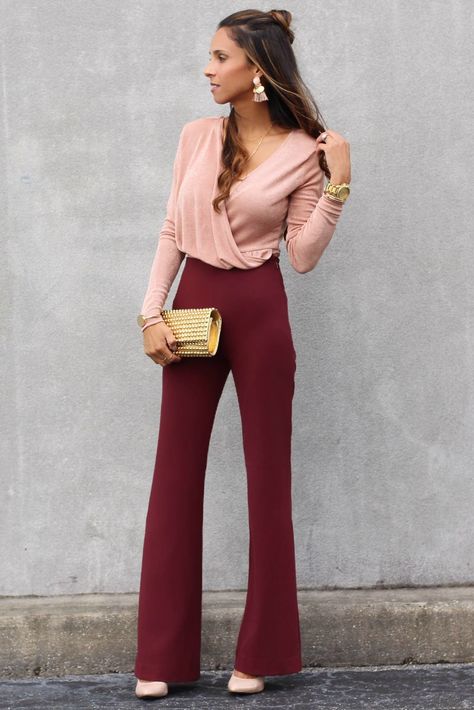 blush bodysuit paired with burgundy high-waist pants Maroon Pant Outfits Women, Colors That Go With Burgundy Outfits, Maroon Slacks Outfit, Burgundy Bell Bottom Pants Outfit, Styling Maroon Pants, Style Maroon Pants, Maroon Slacks Outfit Women, Wine Pants Outfit Work, Burgundy Flare Pants Outfits