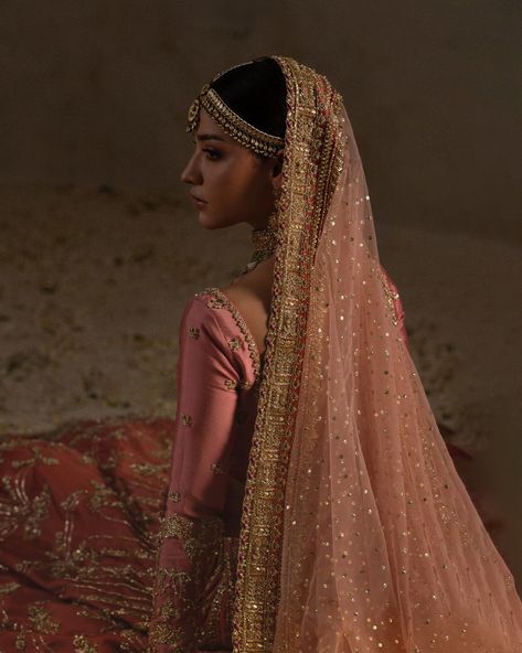 Shahguliya | Silsila | Pardesi Posh Description: A warm coral bridal lehenga paired with a contrasting pink choli, featuring heavily embellished cuffs and motif sprays. The lehenga is adorned with intricate floral borders, scalloped and linear detailing, all highlighted with zardozi and gota accents. Completing the ensemble is a pastel pink net dupatta with delicate scalloped borders and a heavy sequin spray. Fabric Details: Choli & Lehenga: Tissue Raw Silk Dupatta: Net Wash Care: Dry Clea... Pink Indian Aesthetic, Pink Choli, Simple Anarkali, Lehenga Pink, Pakistani Lehenga, Floral Borders, Reception Outfit, Bridal Dupatta, Pink Lehenga