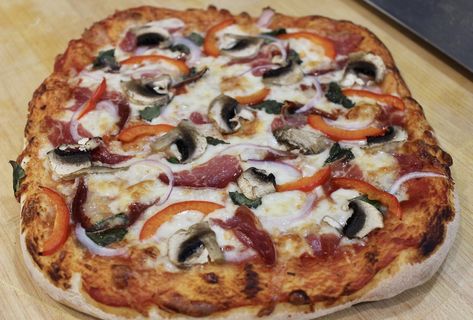 Homemade pizza cooked on the Bakerstone pizza cooker on the barbecue Pizza On The Bbq, Pizza Cooker, Seafood Pizza Recipes, Summer Barbecue Food, Italian Pizzeria, Pizza Baker, Mushroom Pizza Recipes, Mini Pizza Recipes, Stone Pizza Oven