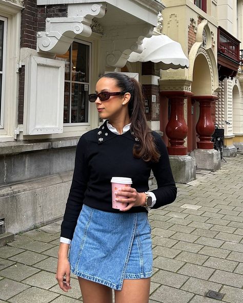 Fall ready with a hot drink & new outfit from @loavies 🍂✨🫶🏽 How cute is this collared sweater with pearls and rhinestones? I paired it with a denim skort and a white button down shirt underneath. To give the outfit an oomph I wore my knee high boots, pearl earrings and sunglasses ✨ Follow @stylingwithcath for more fashion content 🫶🏽 #girlsgoneloavies #loavies #fallootd #autumnootd #falloutfitinspo #denimskort #highponytail #streetstylelook #blackboots #preppyoutfit #pinterestgirl #sweater... Sweater With Shirt Underneath, Sweater With Pearls, Denim Skort, Fashion Content, Collared Sweater, Ootd Fall, White Button Down Shirt, High Ponytails, Preppy Outfit