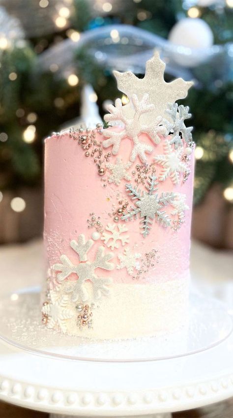 3. Ombre Pink Snowflake Cake How many weeks till Christmas? Have you decked your hall yet? We put our yesterday. Since our decorations done,... Pink Snowflake Cake, Winter Baby Birthday, Winter Onderland Birthday, Winter Onederland Party Girl 1st Birthdays, Winter Onederland Party Girl, Winter Onederland Cake, Snowflake Birthday Party, Christmas Birthday Cake, First Birthday Winter