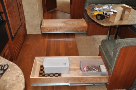 great idea!  pull out drawer mod for under the dinette storage.  drawer slides are not cheap but seems they would pay for themselves in just one camping season!! Dinette Storage, Camper Storage Ideas Travel Trailers, Rv Dinette, Tent Camping Beds, Drawer Ideas, Travel Trailer Organization, Trailer Storage, Pull Out Drawer, Camper Organization