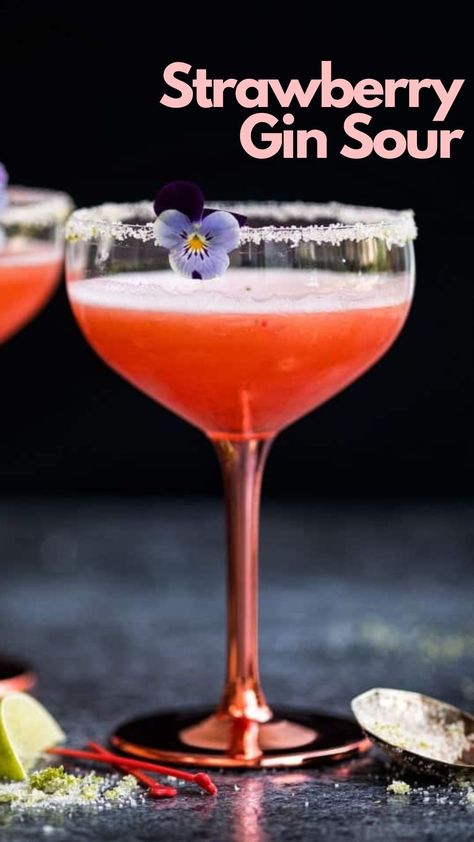 The luscious Strawberry Gin Sour cocktail offers a tantalizing blend of flavors that will captivate any palate. Combining fresh strawberries, gin, St. Germain elderflower liqueur, and a touch of tangy lime juice, this drink strikes a harmonious balance between fruity sweetness and floral elegance. #StrawberryGinSour Strawberry Gin Fizz, Gin And Strawberry Cocktail, Strawberry Sour Cocktail, Gin Strawberry Cocktail, Strawberry Liqueur Cocktails, Gin Sour Cocktail Recipes, Strawberry Drinks Alcohol, St Germain Cocktail Recipes, Strawberry Gin And Tonic