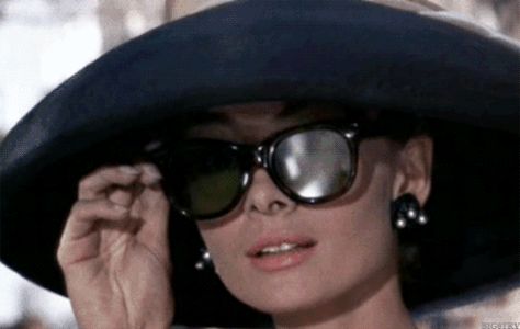 holly golightly GIF Audrey Hepburn Sunglasses, Holly Golightly, Audrey Hepburn Style, Breakfast At Tiffany's, Rock N’roll, Breakfast At Tiffanys, Ringo Starr, Audrey Hepburn, Style Icon