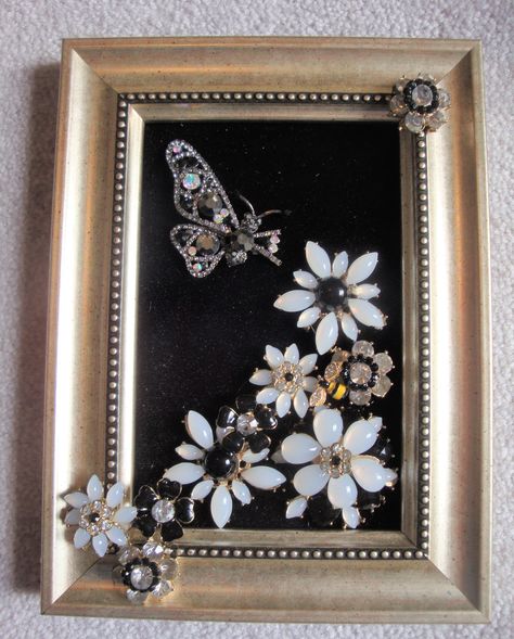 You have chosen a one of a kind creation crafted from beautiful vintage, costume, faux vintage and modern day jewelry, set on a bloack velvet background.  The re-purposed frame was chosen to accentuate the design. This unique design is ready to hang on a wall or sit on a table or an easel. Your family and friends will love the charm it adds to any room.  Each design would make a great family keepsake or heirloom to pass on through the years or a special gift for any occasion. Frame Size 6 x 8 Fr Jewelry Tree Craft, Jewerly Art, Christmas Jewelry Diy, Jeweled Picture Frame, Velvet Background, Jeweled Picture, Old Jewelry Crafts, Costume Jewelry Crafts, Vintage Jewelry Ideas