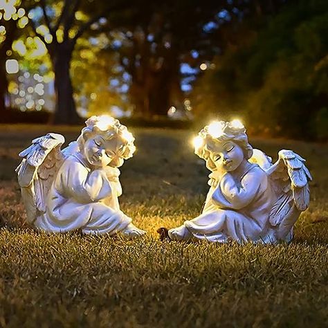 These solar lights outdoor garden statues and decorations for backyard, balcony and deck are waterproof, weatherproof and will stand up to sun and rain without warping or fading. Statue For Garden, Statue Garden, Outdoor Garden Statues, Grave Decorations, Angel Statue, Outdoor Living Decor, Garden Angels, Outdoor Lighting Landscape, Angel Statues