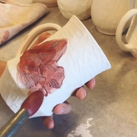 Pottery Making Info on Instagram: “From @potting_along • • • • • • Painting a red iron oxide wash into a carving 🤍 Not seen here - Proceeding to wipe the wash off to leave it…” Oxide Glaze Pottery, Oxide Ceramics, Oxides On Ceramics, Oxide Wash Pottery, Pottery Iron Oxide, Iron Oxide Wash Pottery, Red Iron Oxide Wash Pottery, Pottery Videos, Red Clay