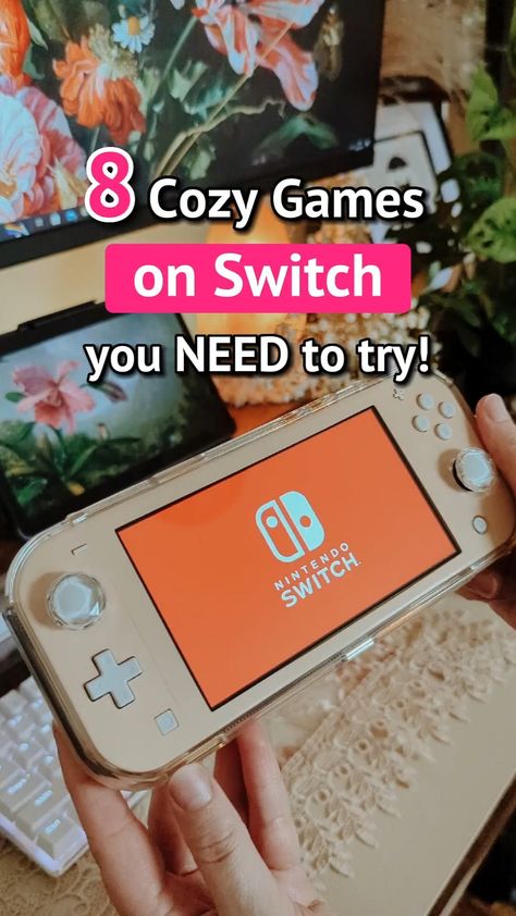 Text overlayed on an image. Text reads: 8 Cozy Games on Switch you need to try. Image depicts hands holding a Nintendo Switch lite in beige above a dark wood desk desk and white keyboard. Green plants and white petaled flowers to the right. Nintendo Switch Games For Adults, Free Cozy Games On Switch, Fun Switch Games, Cozy Gaming Switch, Switch Games For Women, Cosy Switch Games, Best Switch Games, Cozy Games On Switch, Cozy Games Switch