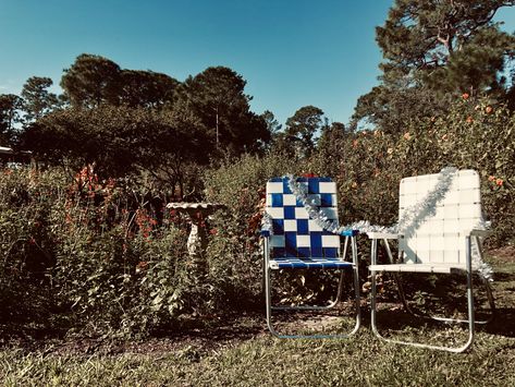 Lawn Chair Aesthetic, Beach Chair With Canopy, Lawn Chair, Cheap Chairs, Visual Board, Person Sitting, Lawn Chairs, Scenic Design, Bright And Beautiful