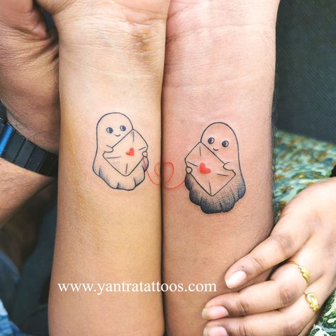 "Love beyond the veil: a tale of ghostly #love etched in #ink and sealed with heartfelt letters." 💌👻💉 #tattooing #yantratattoos #strengthinletters #tattoooftheday #InkedLoveStories #GhostlyRomance #LetterLoveAffair Halloween Matching Tattoos Couples, Spooky Matching Tattoos For Couples, Matching Halloween Tattoos For Couples, Ghost Couple Tattoo, Anime Couple Tattoos, Girly Hand Tattoos, No Tattoo, Moving On Tattoos, Couples Tattoo