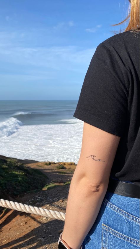 Cross Wave Tattoo, Waves Fine Line Tattoo, Wave Tattoo Back Of Arm, Wave Tattoo Ribcage, Wave Tattoo Women, Wave Tattoo Placement Ideas, All Waves Eventually Pass Tattoo, Tattoo Waves Ocean, Ocean Wave Tattoos For Women