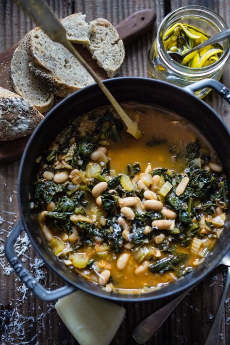 A flavorful hearty stew from Tuscany, called Ribollita with Cannellini beans, lacinato kale, and vegetables, served with crusty bread, drizzled with a Lemon Rosemary Garlic Oil. | www.feastingathome.com Slow Carb Recipes, Healthy Stew, Lacinato Kale, Tuscan White Bean, Tuscan Bean Soup, Feasting At Home, Vegetarian Soup Recipes, Italian Recipes Easy, Rosemary Garlic