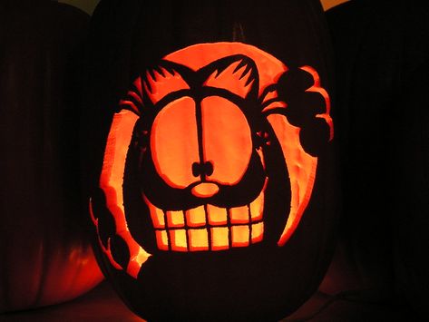 Garfield | Now on facebook: facebook.com/pumpkinwayne | PumpkinWayne | Flickr Garfield Pumpkin, Funny Pumpkin Carvings, Creative Pumpkin Painting, Cute Pumpkin Carving, Pumkin Carving, Halloween Pumpkin Carving Stencils, Creative Pumpkin Carving, Amazing Pumpkin Carving, Pumpkin Carving Designs