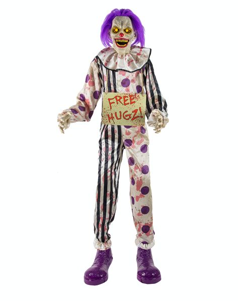 Hugz the Clown was an animatronic sold by Spirit Halloween for the 2018 and 2019 Halloween seasons as well as online for the 2020 season. It resembled a clown that wore a multi-colored suit, purple shoes, and a purple wig, as well as a "Free Hugz!" sign around its neck written in apparent blood. When activated, it moved its mouth to one of several phrases before, and after, lunging its upper half forward with its arms outstretched. "Welcome to the fun house! Hugz the Clown may seem like a ... Spirit Halloween Animatronics, Halloween Decorations Uk, Halloween Props Scary, Halloween Spirit Store, Halloween Decorations To Make, Halloween Animatronics, Suit Purple, Halloween Costume Store, Spirit Store