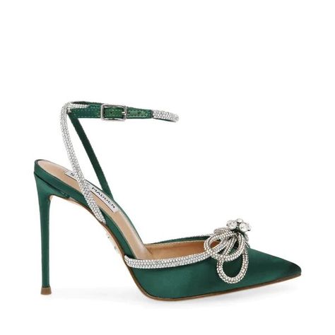 Crafted in luxe emerald satin, this dark green stiletto heel is party pump perfection. The shimmering trim and bow embellishments add dimension to the modern silhouette. Faux satin upper material Rhinestone detailing 4.25" heel height Sizing Advice: Due to the vinyl upper, this style tends to run small. We recommend ordering ½-1 size bigger than your usual size. Green Heels Outfit, Emerald Green Heels, Emerald Shoes, Green Shoes Heels, Steve Madden Store, Party Pumps, Prom Heels, Heels Outfits, Green Heels