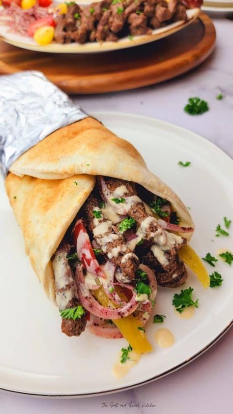 The best way to treat dad on Father’s Day is to cook an epic spread of his favorite dishes. So if you are wondering what to make for Father’s Day, then you have come to the right place. Here’s a round-up of 30+ of my favorite Father’s Day Dinner Ideas that dads all over the world will love! Lebanese Shawarma, Beef Shawarma, Lebanon Food, Shawarma Seasoning, Beef Wraps, Gyro Recipe, Italian Cuisine Recipe, Shawarma Recipe, Sweet Kitchen