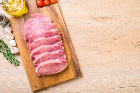 Fresh pork raw fillet | Premium Photo #Freepik #photo #food #red #board #meat Center Cut Pork Roast, Meat Photography, Sauce Béarnaise, Raw Pork, Sauce Tartare, Sauce Au Poivre, Pork Steak, Pork Cutlets, Pork Meat