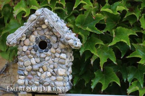 Stone birdhouses are easy to make and, with the right materials, can be kept in the garden year-round. The trick is to use a sturdy wood birdhouse as the base, and attach stones with the right adhesive for a lasting bond. All the information is in this tutorial. Stone Birdhouses, Diy Rock Garden, Recycled Garden Art, Wood Birdhouses, Bird House Plans, Unique Bird Houses, Bird House Kits, Bird Aviary, Birdhouse Designs