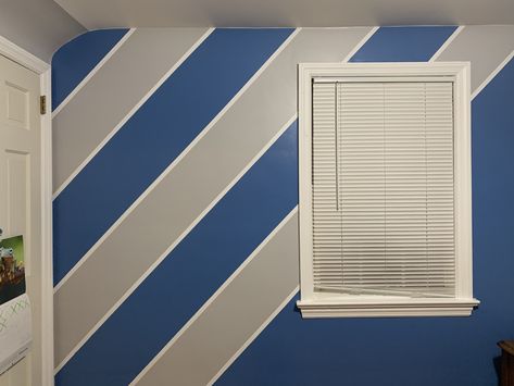 Blue Tape Designs Accent Walls, Blue Stripe Painted Wall, Stripe Border Wall Paint Ideas, Stripes Wall Paint, Painting Horizontal Stripes On Wall, Cat Tembok Motif, House Paint Design, Stripe Wall, House Wall Design