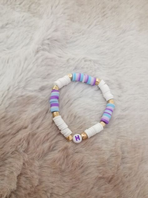 <3 Clay Bead Bracelet Ideas Purple And Pink, Preppy Bracelet Ideas, Clay Bead Ideas, Clay Bead Bracelet Ideas, Bead Bracelet Ideas, Clay Bead Bracelets, Things To Make And Sell, Book Crafts Diy, Gifts 2023