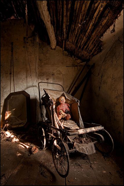 Alone in the Dark    Left alone, waiting patiently for one last playtime that will never come. Abandoned Property, Old Abandoned Houses, Alone In The Dark, Fotografi Vintage, Abandoned Mansions, Scary Places, Baby Carriage, Left Alone, Haunted Places