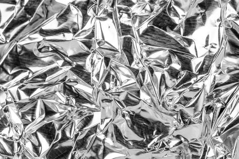 Whether you use it for cooking or storing leftovers, aluminum foil is a kitchen mainstay. But could it also be bad for you? Medicine Packaging, Foil Packaging, Bone Diseases, Aluminium Foil, Silver Background, Medicine Boxes, Aluminum Can, Tin Foil, Air Duct