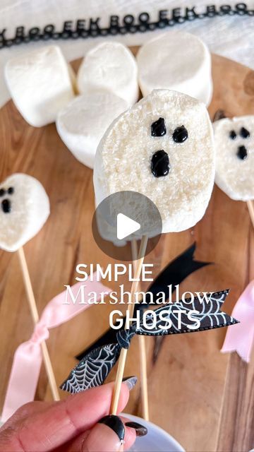 Andrea Clawson on Instagram: "Halloween treat idea: marshmallow ghosties 👻   These Halloween treats are so simple to recreate and will be perfect for any spooky night!   I took a jumbo @kraftjetpuffed marshmallows and cut them in half. I dipped them in white shimmer sugar and added a ghost face using black writing icing.  My boys loved adding them to their hot chocolate this morning. They would be perfect for Halloween s’mores or on top of cupcakes too!  Save for inspo and share with friends!   #halloweentreats #halloweenparty #halloweenpartyfood #halloweenkidsparty #craftymom #craftymomma #fallparty #partyideas #hostingaparty #halloweendesserts #halloweenfood #halloweensnacks #targethalloween #targetdollarspot" Halloween Kids Crafts Easy, Writing Icing, Marshmellow Treats, Marshmallow Ghosts, Target Halloween, Spooky Night, Marshmallow Treats, Black Writing, Ghost Face