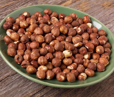 Honey-and-Spice Roasted Hazelnuts | Put these addictive sweet-and-spicy nuts out at your next cocktail party. Vegan Apps, Hazelnut Recipes, Spicy Nuts, Roasted Hazelnuts, Scd Recipes, Harvest Recipes, How To Roast Hazelnuts, Roasted Nuts, Spicy Snacks