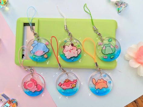 BUBBLE FRIENDS PHONE CHARMS These cute, mini acrylic phone charms are great for decorating phones, bags, anywhere with a clip/attachment you can hang it to! :) Item Details: * Full Colour Print * Double Sided Protective Epoxy * Matching Colour Phone Strap and Lobster Clasp * A little friend to take out with on adventures  SIZE (Height x Width): All charms, not including the strap are 45MM/1.7" x 45MM/1.7"! With strap: 3" H x 1.7" W including full length + charm! Characters included in this set: Acrylic Phone Charms, Bling Phone Cases Diy, Cute Merch, Acrylic Phone, Bling Phone Cases, Mini Phone, Acrylic Keychains, Phone Charms, Colour Print