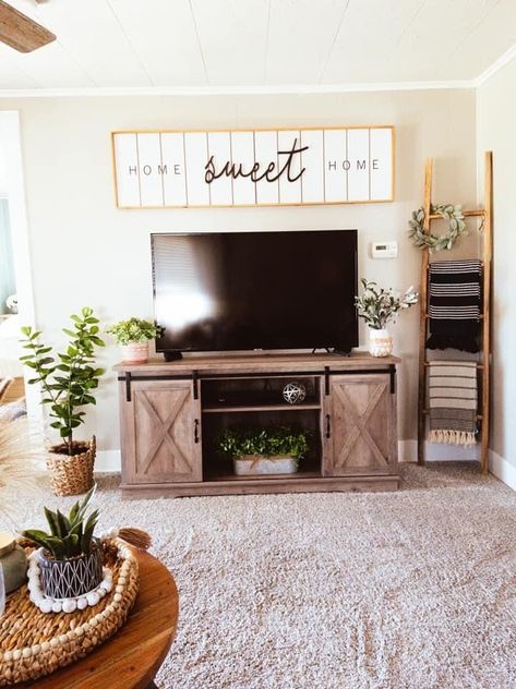 #decor #livingroomideas Under Tv Decor Mount Tv Living Rooms, Decorate Around Tv Stand Living Rooms, Next To Tv Stand Decor, Under Tv Stand Decor, Tv Stand Decor Simple, Wall Behind Tv Decor Living Rooms, Beside Tv Wall Decor, Living Room Wall Decor Ideas Above Tv, Over Tv Wall Decor Living Room Boho