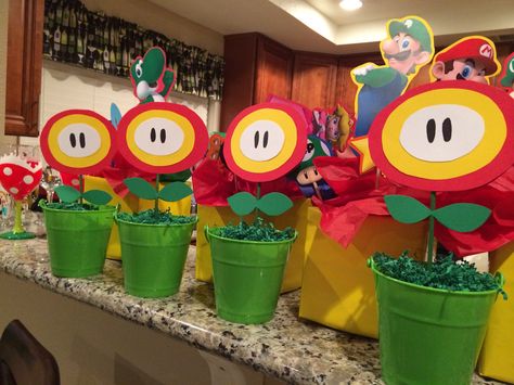 Mario birthday party fire flower center pieces Mario Decorations, Mario Party Ideas, Mario Brothers Birthday Party, Princess Peach Party, Mario Kart Party, Mario Bros Birthday Party Ideas, Nintendo Party, Super Mario Bros Birthday, Mario Bros Birthday Party